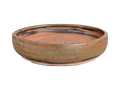 Bronze and copper shallow round pot with a low profile, copper-red glaze flecks and clay foot ring