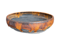Amber and charcoal shallow round pot with amber glaze drips, a dark interior and gray foot ring